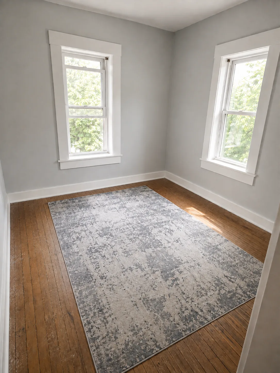 Finished guest room with painted walls and restored wood floor