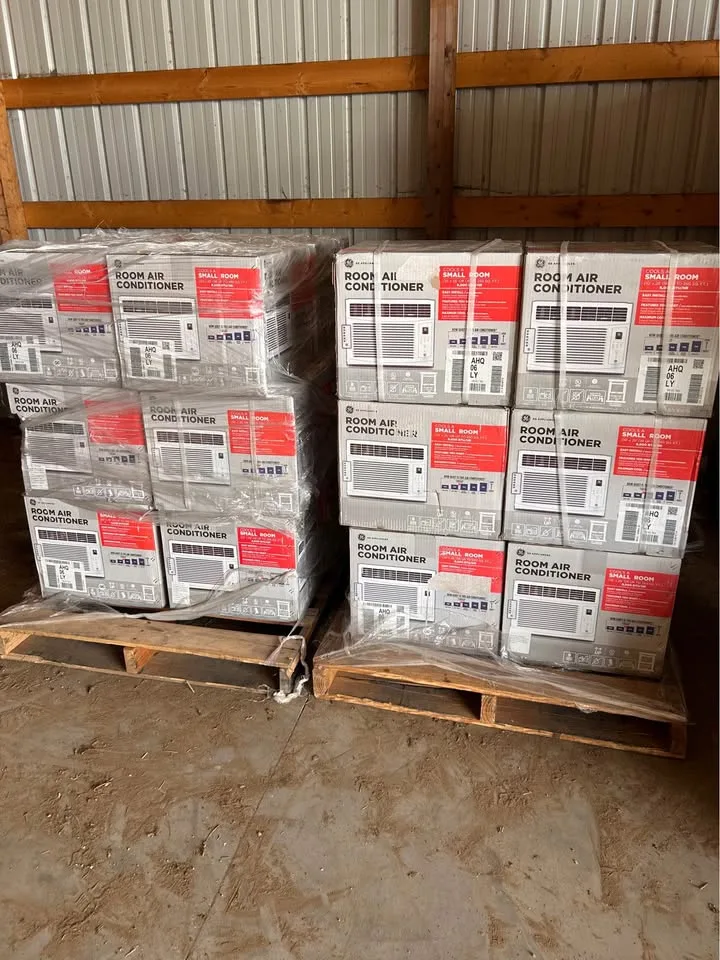 Pallets of boxed GE room air conditioners