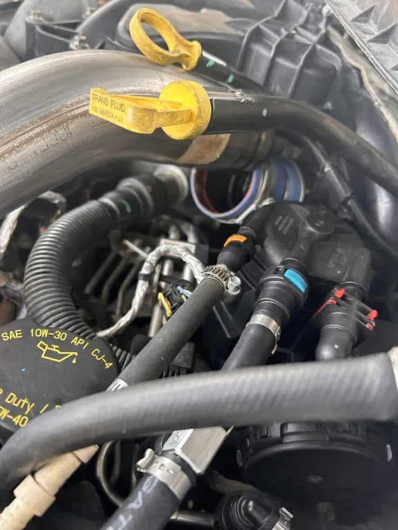 Diesel engine bay during a disaster prevention kit install